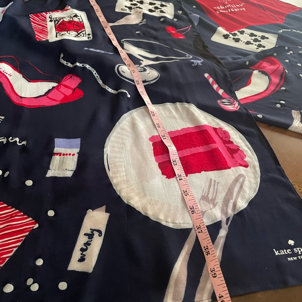 Kate Spade “Party Games”80x25 inch Navy and Pink Graphic Scarf.New without tag.